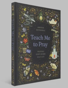 Cover of the book 'Teach Me to Pray' by Kristen Wetherell, featuring the subtitle 'Praying God's Word from A to Z'. The design includes whimsical illustrations for each letter of the alphabet—such as a snake for S, lantern for L, butterfly for Y, and church for K—set against a dark background with golden leaf patterns.